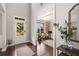 Inviting foyer with hardwood floors and view into sitting room at 4371 Wigley Preserve Dr, Marietta, GA 30066