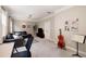 Spacious living room featuring a desk space, comfortable seating, and a media center at 4371 Wigley Preserve Dr, Marietta, GA 30066
