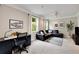 Cozy living room with desk space, ample natural light, and comfortable seating at 4371 Wigley Preserve Dr, Marietta, GA 30066
