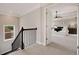 View into the bright main bedroom, complete with ceiling fan, neutral walls and carpeted floor at 4371 Wigley Preserve Dr, Marietta, GA 30066