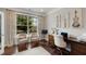 Sunlit sitting room with large window and hardwood floors at 4371 Wigley Preserve Dr, Marietta, GA 30066