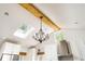 Bright kitchen with white cabinetry, stainless steel appliances, and a skylight at 936 Ormewood Se Ter, Atlanta, GA 30316