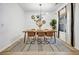 Stylishly designed dining room with modern light fixture and contemporary decor at 1233 Miss Irene Ln, Lawrenceville, GA 30044