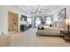 Spacious primary bedroom suite with a large bed, elegant decor, and an en-suite bathroom at 1233 Miss Irene Ln, Lawrenceville, GA 30044