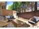 Relaxing backyard patio features outdoor seating and landscaping at 1233 Miss Irene Ln, Lawrenceville, GA 30044