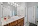 Bathroom featuring double sinks, granite countertops, and tiled floors at 139 Mountain Vista Blvd, Canton, GA 30115