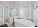 Bright bathroom featuring a soaking tub and a separate shower at 139 Mountain Vista Blvd, Canton, GA 30115