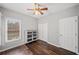 Inviting bedroom with wood floors, window, closet, and neutral paint at 139 Mountain Vista Blvd, Canton, GA 30115