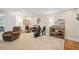 Inviting living room space with neutral tones, offering a relaxing area for leisure and activities at 139 Mountain Vista Blvd, Canton, GA 30115