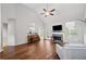 Spacious living room with cathedral ceilings, fireplace, and hardwood floors at 139 Mountain Vista Blvd, Canton, GA 30115