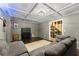 Finished basement features a coffered ceiling, neutral paint and an open stairwell at 1920 Pilgrim Rd, Cumming, GA 30040