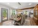 Stylish dining room with elegant light fixture and seamless access to the kitchen at 1920 Pilgrim Rd, Cumming, GA 30040
