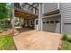Back of the house with walk out basement and garage with back yard access at 1920 Pilgrim Rd, Cumming, GA 30040