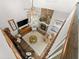 An aerial view showcases a cozy living room with stone fireplace, and open floorplan at 1920 Pilgrim Rd, Cumming, GA 30040