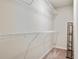 Walk-in closet has built-in shelving at 1360 Sugar Glen Ct, Lawrenceville, GA 30044