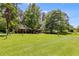 Lush backyard featuring mature trees and ample space, ideal for outdoor living and recreation at 4544 Ridgeview Dr, Powder Springs, GA 30127