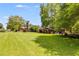 Expansive backyard featuring a storage shed and lush green lawn, perfect for outdoor activities and relaxation at 4544 Ridgeview Dr, Powder Springs, GA 30127