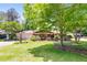 Charming single-story home with a well-manicured lawn and inviting front porch, creating a welcoming curb appeal at 4544 Ridgeview Dr, Powder Springs, GA 30127