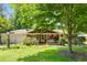 Charming single story home with brick facade, mature landscaping, and a cozy front porch at 4544 Ridgeview Dr, Powder Springs, GA 30127