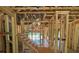 Unfinished staircase of new construction home showing the stud framing and planned staircase layout at 5371 Heron Bay Blvd, Locust Grove, GA 30248