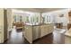 Spacious kitchen with a granite island, stainless steel appliances and an open concept living area at 11375 Crestview Ter, Johns Creek, GA 30024