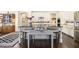 Elegant kitchen with white cabinetry, granite countertops, and stainless steel appliances at 11375 Crestview Ter, Johns Creek, GA 30024