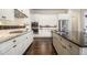 Bright and updated kitchen with an island, stainless steel appliances and ample counter space at 11375 Crestview Ter, Johns Creek, GA 30024