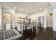 Gourmet kitchen with a central island, stainless steel appliances and a large walk through to other living spaces at 11375 Crestview Ter, Johns Creek, GA 30024