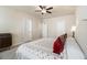 Spacious main bedroom with ample closet space and a ceiling fan at 11375 Crestview Ter, Johns Creek, GA 30024