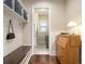 Inviting mudroom features bench seating, shelving, and access to the laundry room at 11375 Crestview Ter, Johns Creek, GA 30024