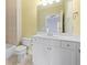 Bright bathroom features a tub, tile surround, vanity with storage, and neutral colors at 2301 Kirk Farm Nw Pl, Kennesaw, GA 30152