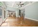 Open-concept living space with hardwood floors and seamless flow to kitchen and outdoor deck at 2301 Kirk Farm Nw Pl, Kennesaw, GA 30152