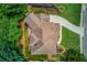 Aerial view of a home with a long driveway and lush landscaping at 255 Beech Tree Holw, Sugar Hill, GA 30518