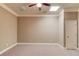 Finished basement with neutral walls and carpet, ceiling fan and drop ceiling with recessed lighting at 255 Beech Tree Holw, Sugar Hill, GA 30518