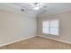 Bedroom with neutral walls, a ceiling fan, carpet, trim, and a window with white blinds at 255 Beech Tree Holw, Sugar Hill, GA 30518