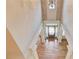 Spacious foyer with hardwood floors, a decorative front door, and transom windows at 255 Beech Tree Holw, Sugar Hill, GA 30518