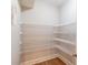 Spacious pantry with ample storage and wire shelving at 255 Beech Tree Holw, Sugar Hill, GA 30518