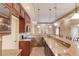 Gorgeous wet bar with stone counters, stainless steel appliances, and custom cabinetry at 255 Beech Tree Holw, Sugar Hill, GA 30518