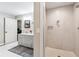 Modern bathroom featuring a walk-in shower and granite countertop vanity and updated fixtures at 3248 Wildwood Sw Dr, Marietta, GA 30060
