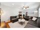 Bright and airy living room featuring a comfortable sectional sofa and modern decor at 3248 Wildwood Sw Dr, Marietta, GA 30060