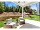 Relaxing back porch offering a serene outdoor experience with views of backyard at 4011 Fallen Leaf Ct, Kennesaw, GA 30152