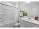 Bright bathroom featuring a shower-tub combo and single sink vanity at 4011 Fallen Leaf Ct, Kennesaw, GA 30152