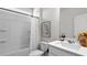 Bright bathroom featuring a tub and shower combination, vanity and plenty of storage at 4011 Fallen Leaf Ct, Kennesaw, GA 30152