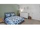 Charming bedroom, decorated with dinosaurs and featuring a cozy bed and dresser at 4011 Fallen Leaf Ct, Kennesaw, GA 30152