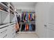 Spacious walk-in closet with custom shelving and ample storage for clothes, shoes, and accessories at 4011 Fallen Leaf Ct, Kennesaw, GA 30152