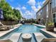 Gorgeous backyard pool with a lounge area, providing a relaxing outdoor experience at 5220 Southern Hills Ln, Cumming, GA 30040