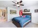 Bedroom with a ceiling fan, pennant, and natural light at 5220 Southern Hills Ln, Cumming, GA 30040