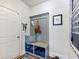 Cozy entryway with built-in bench, storage, and decorative accents at 5220 Southern Hills Ln, Cumming, GA 30040