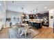 Eat-in kitchen with island, stainless appliances, and access to the backyard at 5220 Southern Hills Ln, Cumming, GA 30040