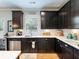 Kitchen featuring stainless appliances, white countertops and ample cabinet space at 5220 Southern Hills Ln, Cumming, GA 30040